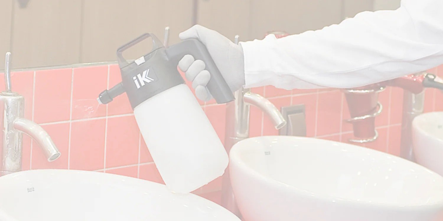 spraying sanitiser liquid from our range