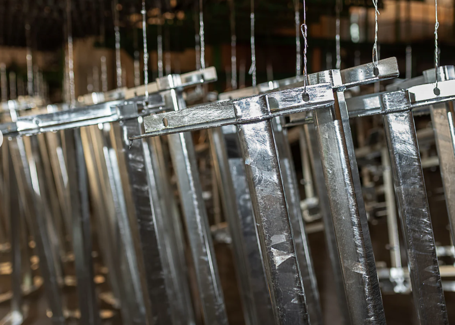 metal hanging after chemical treatment which should be neutralised to ensure no contamination with further chemical processes