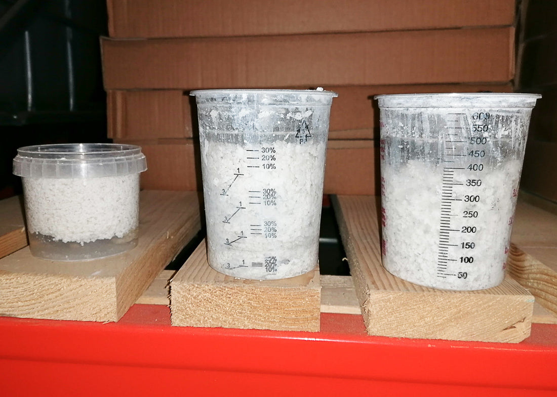 photo showing coagulation of industrial water and the separation of paint solids 