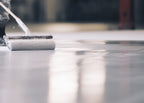 photo showing the application of our protective, peelable floor coating