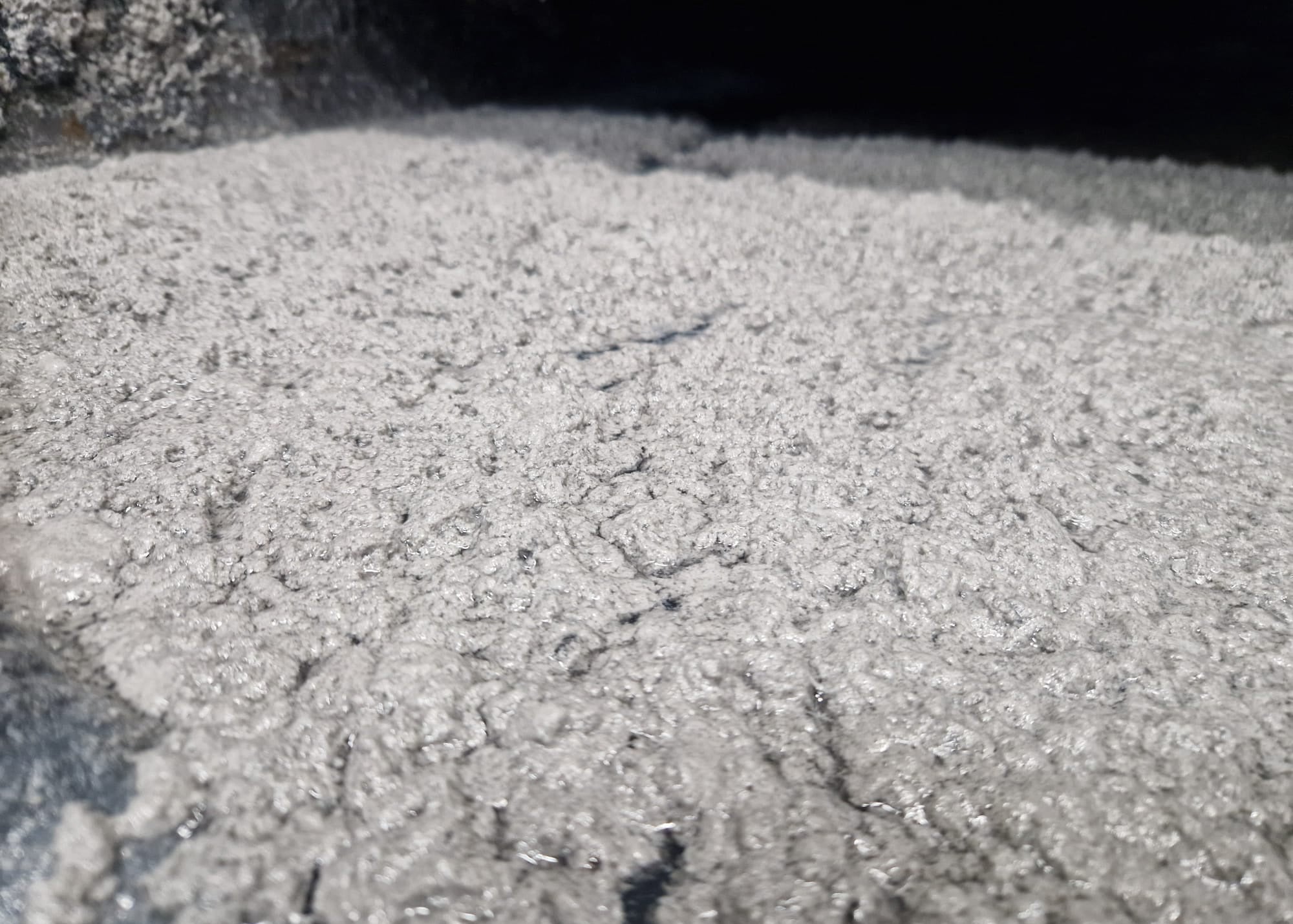 spray booth water containing lacquer after being treated with our specialist treatments