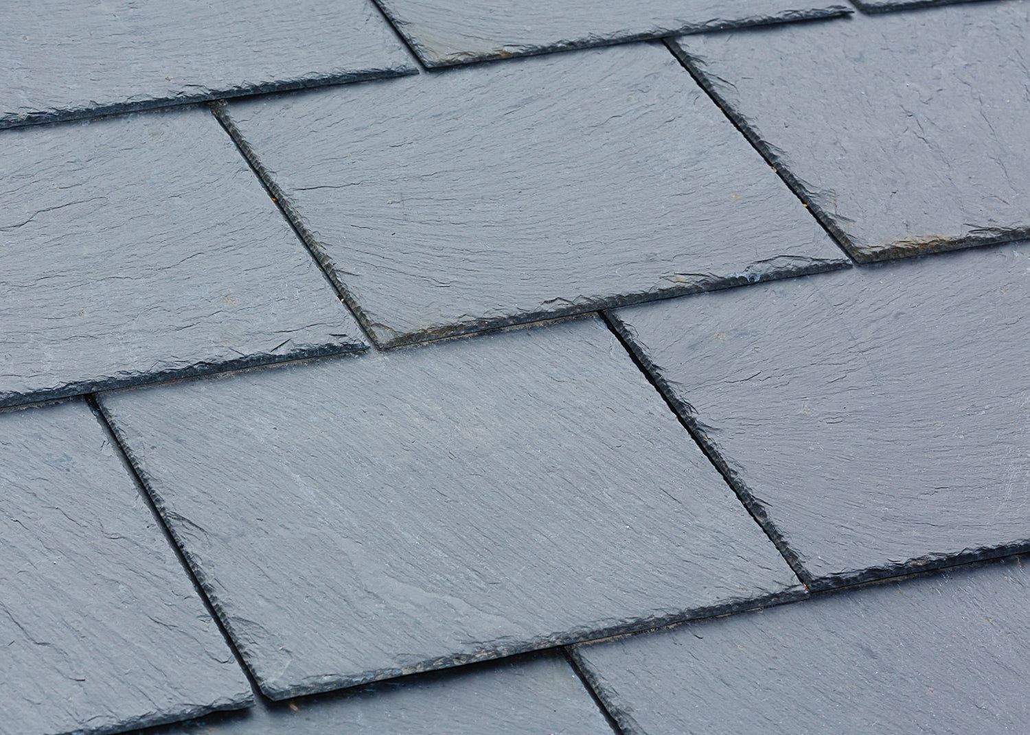 slate roof has has no signs of moss growth nor any greening. Baticlean CR is used to clean hard surfaces.