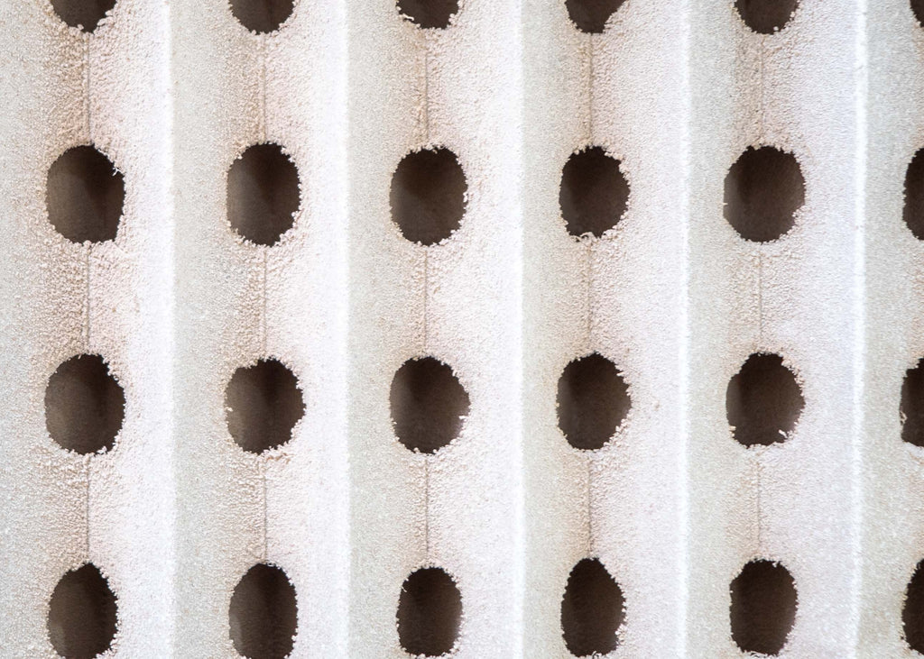 spray booth filter that is being used to collect paint, as can be seen the paint is being held on the face of the filter