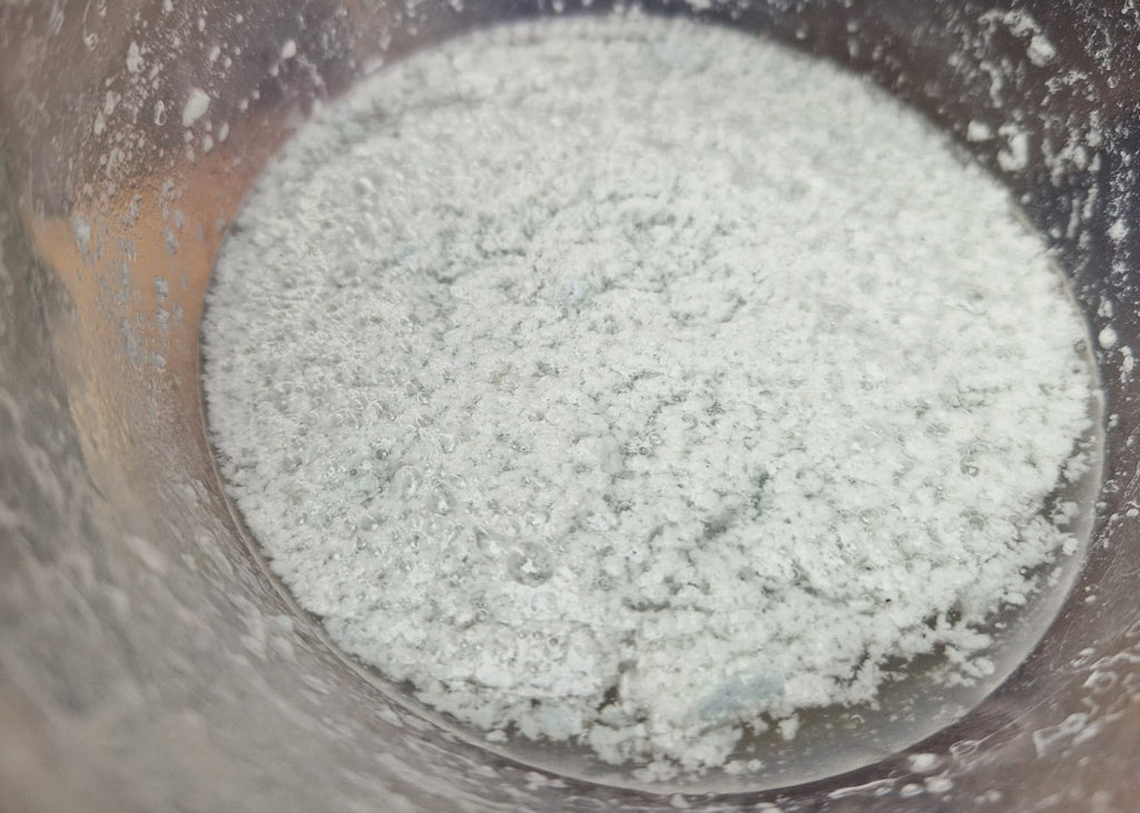 lacquer separated from spray booth water as part of a titration test 