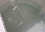 separated paint solids settled within our mixing tank before being pumped into filtration sack